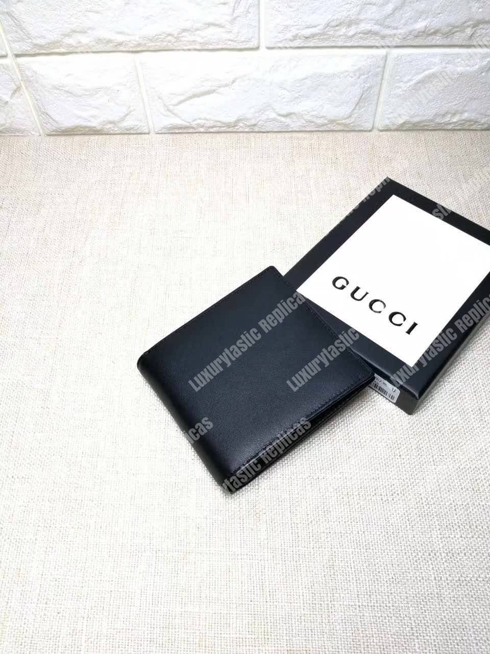 G*u*i leather bi-fold wallet black