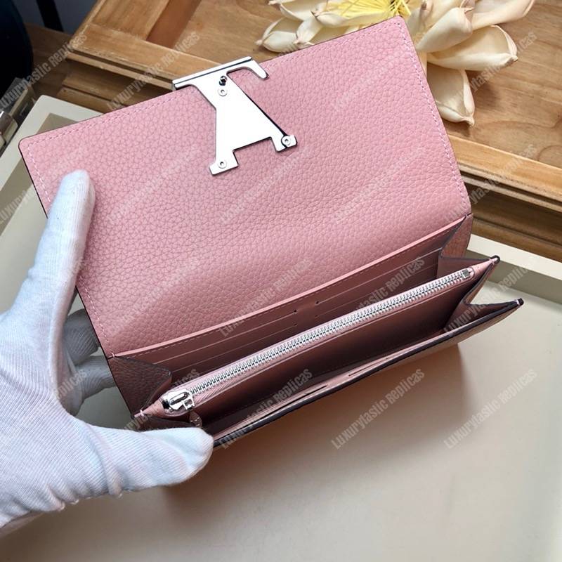 LV Capucines Wallet Taurillon Magnolia