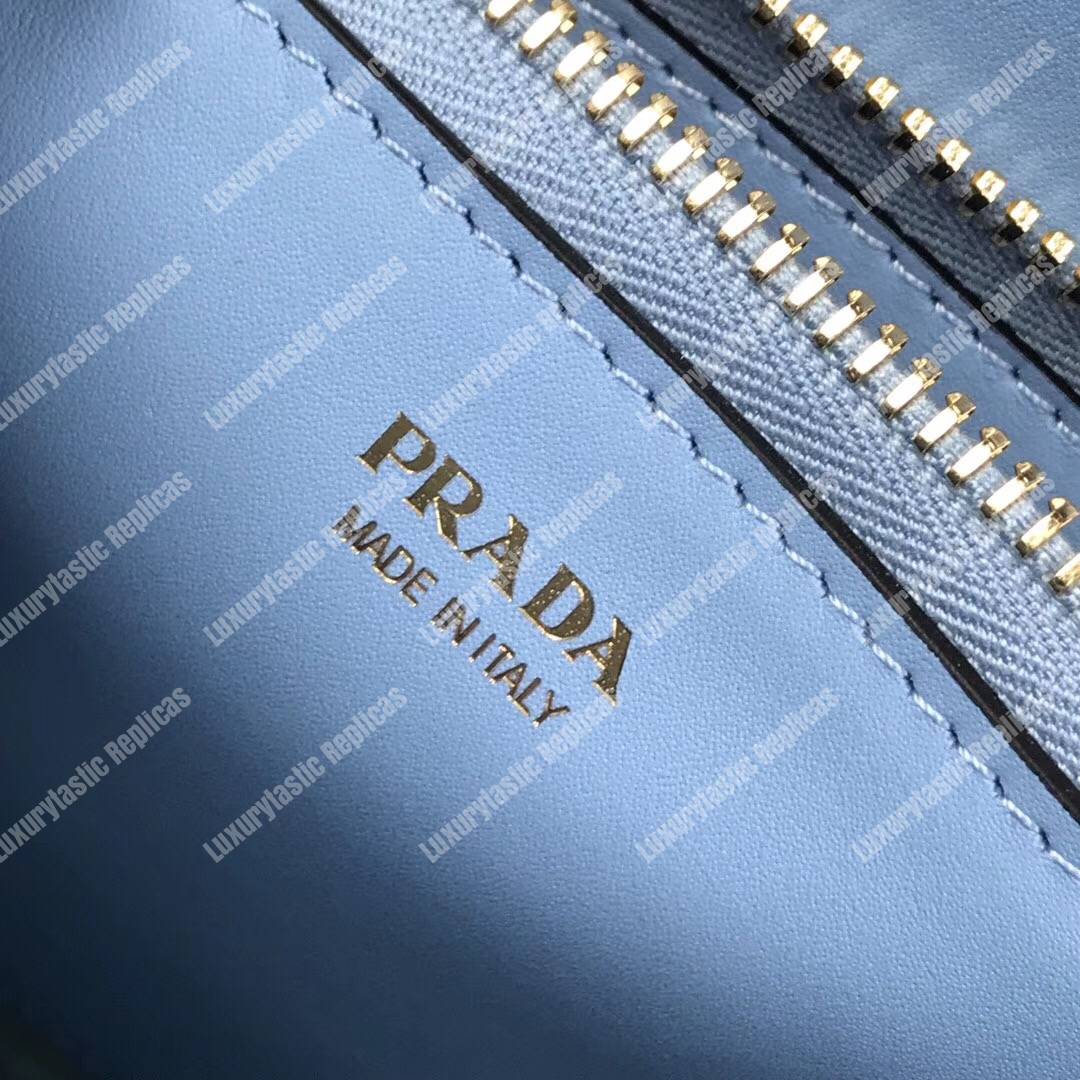 pra*a monoCh*0me saffiano leather bag light blue