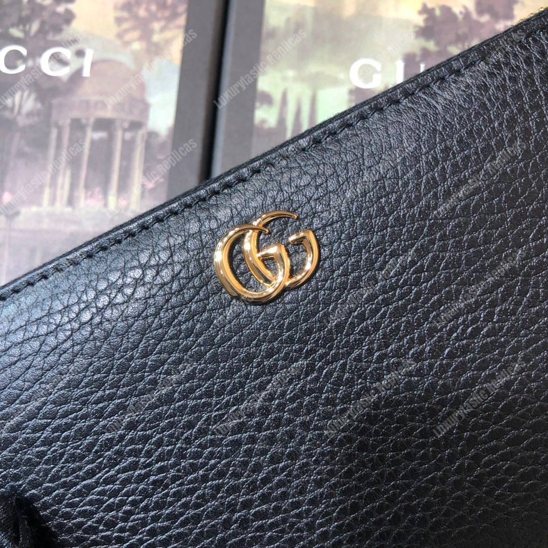 G*u*i leather zip around wallet black