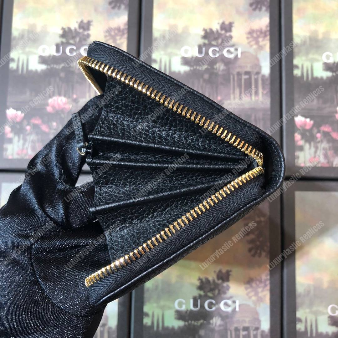 G*u*i leather zip around wallet black