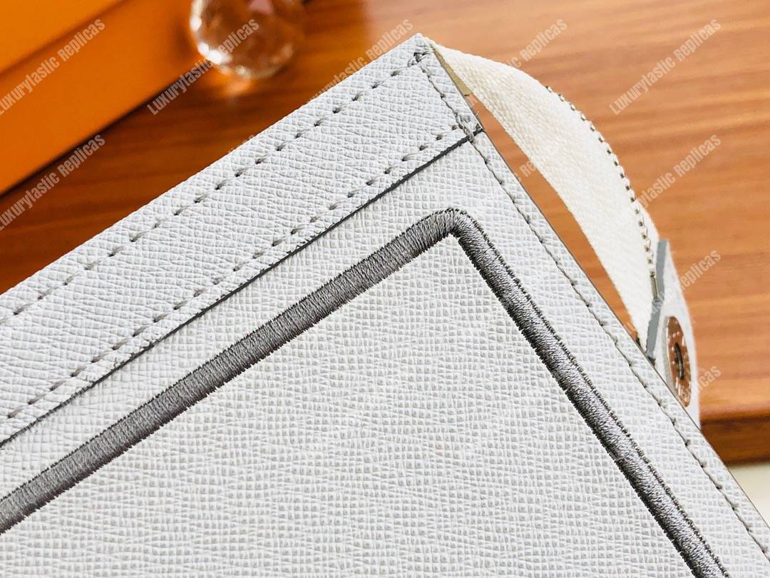 LV Pochette Voyage MM Taiga Leather White