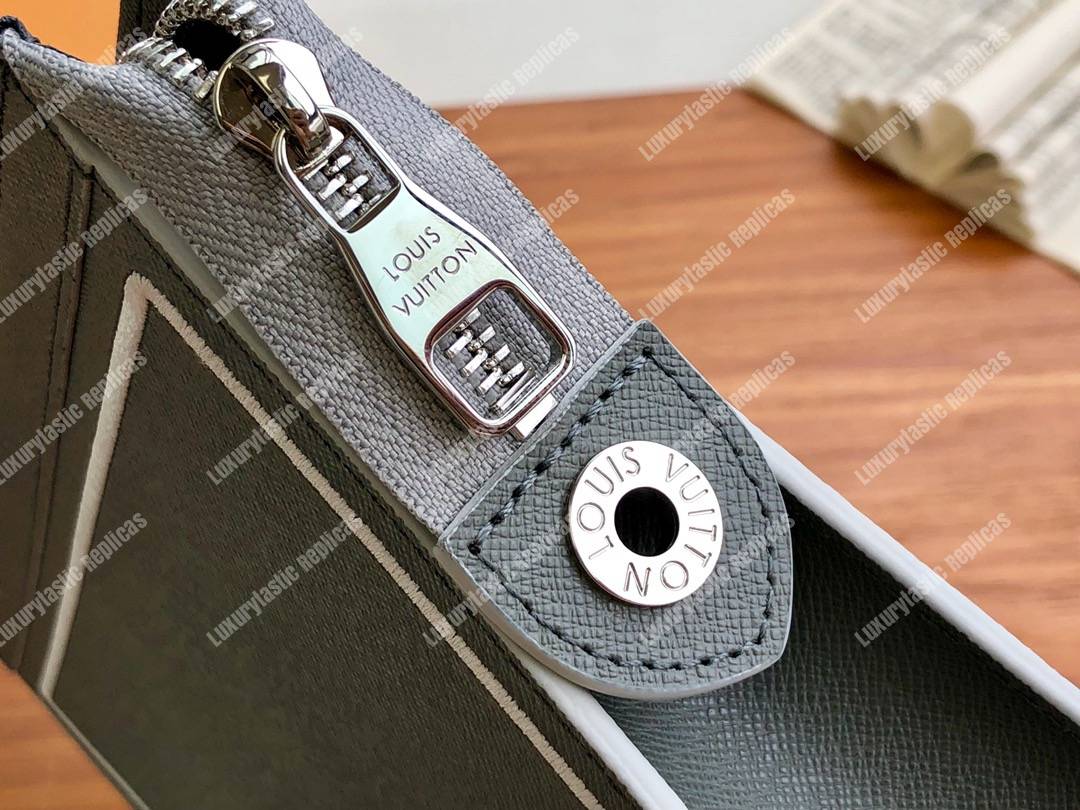 LV Pochette Voyage MM Taiga Leather Black