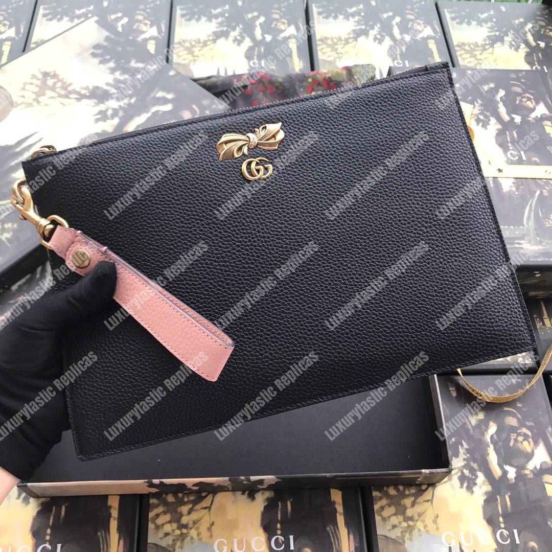 G*u*i leather pouch with bow black