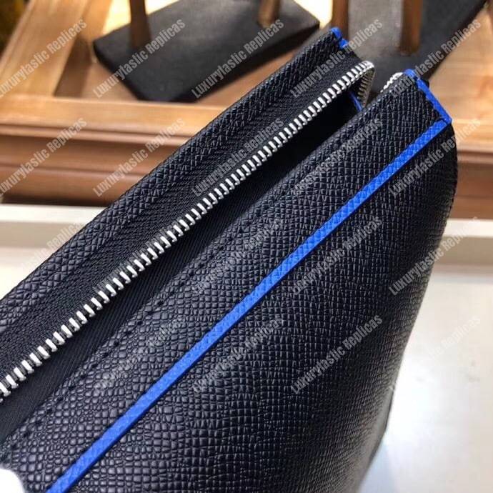 LV Pochette Voyage Taiga Leather