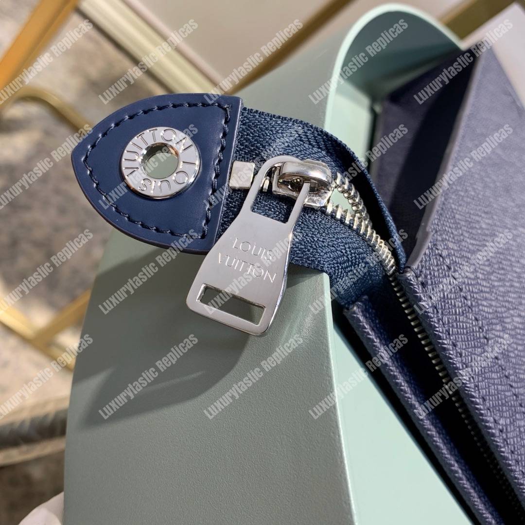 LV Pochette Voyage MM Taiga Leather Navy Blue
