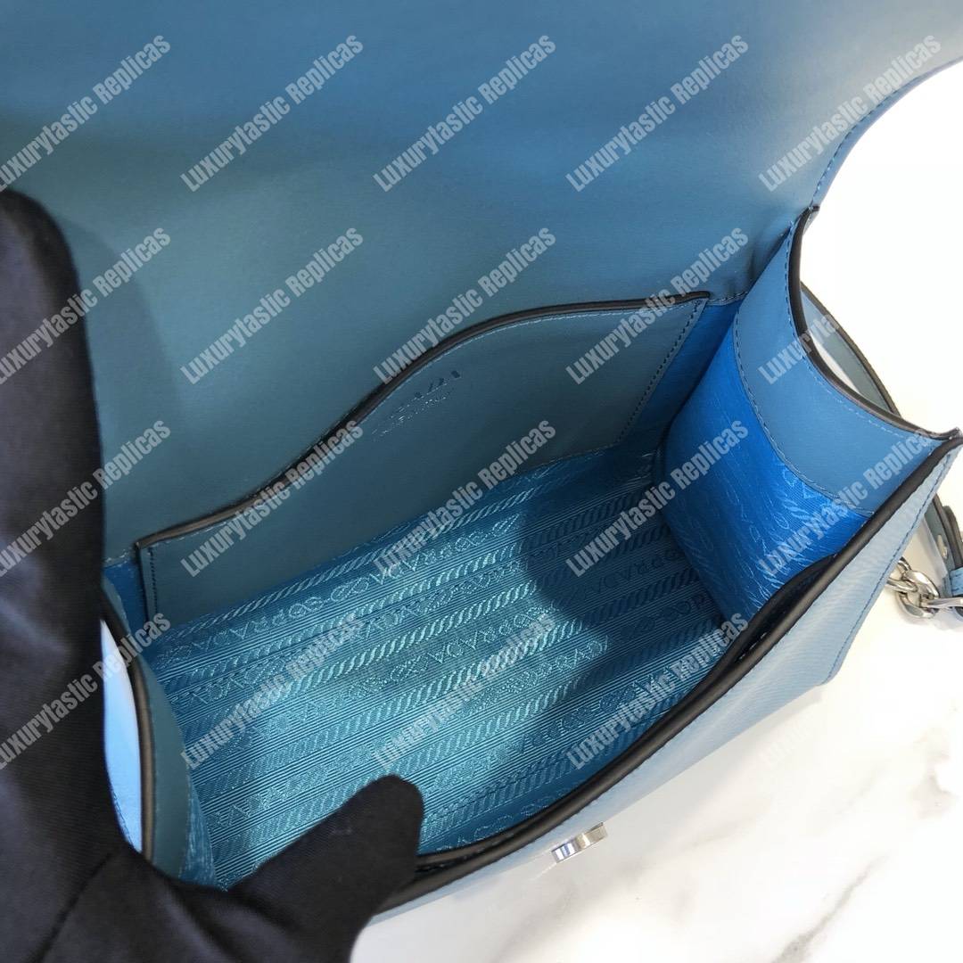 pra*a monoCh*0me saffiano leather bag light blue