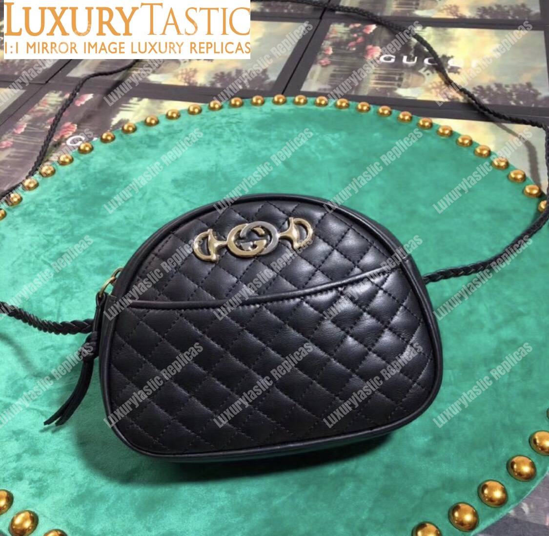 G*u*i leather mini bag black