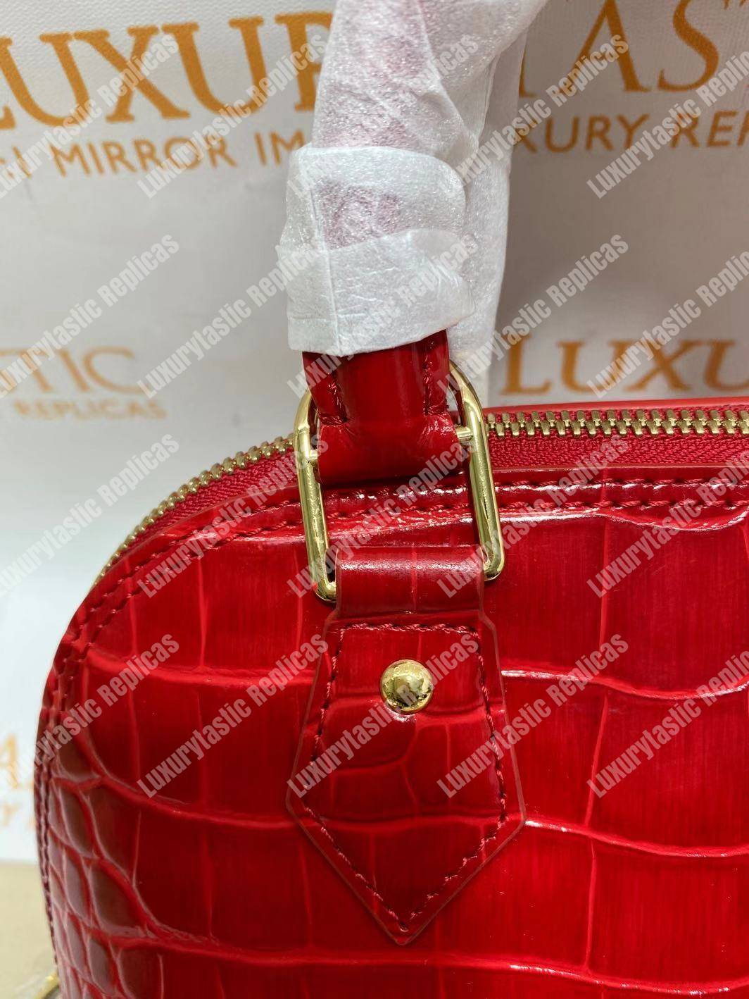 LV Alma BB Crocodilien Brillant Cerise