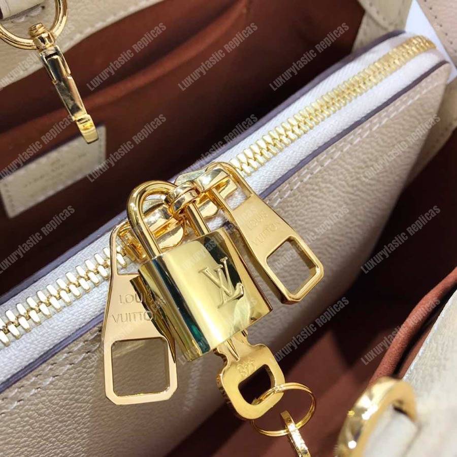 LV Montaigne BB Monogram Empreinte Leather Crème