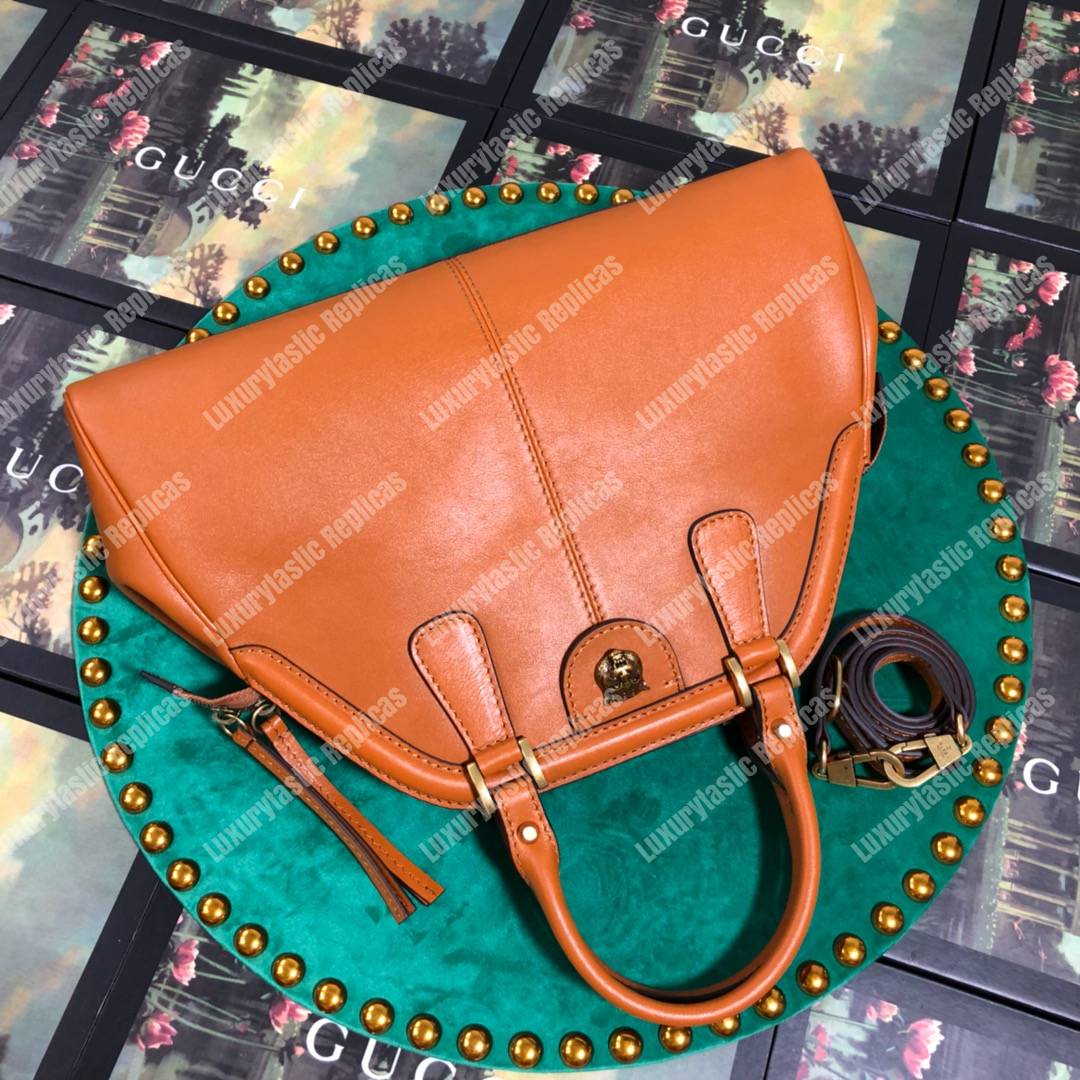 G*u*i re(belle) medium shoulder bag leather orange
