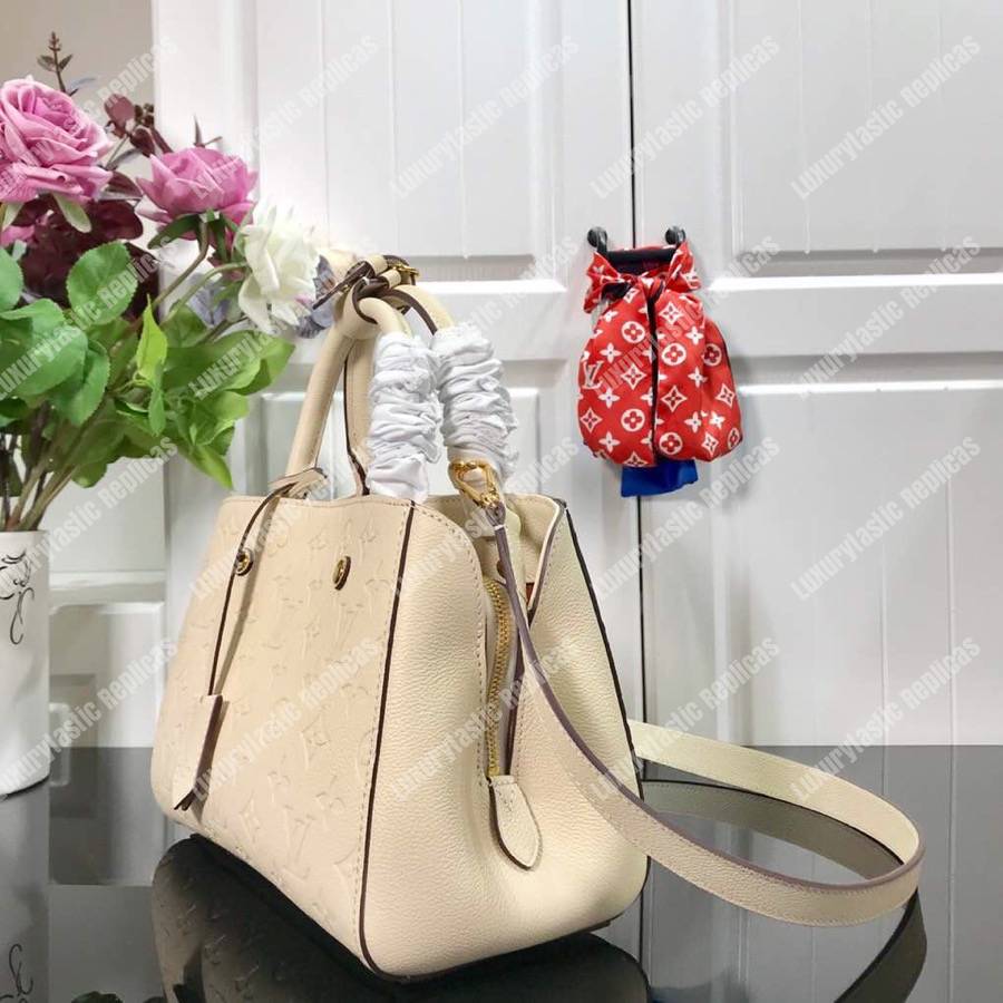 LV Montaigne BB Monogram Empreinte Leather Crème