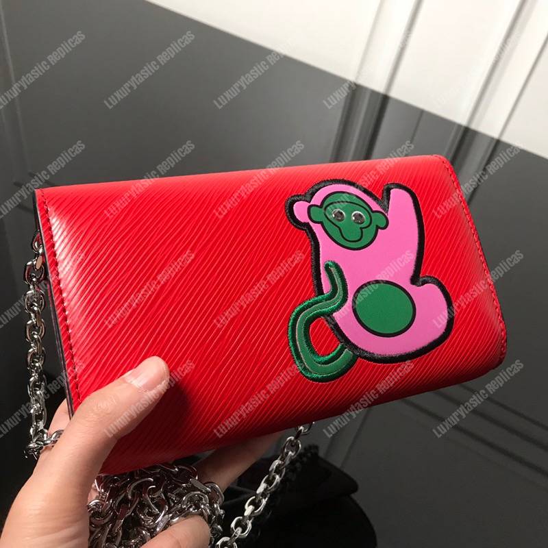 LV Twist Chain Wallet Epi Leather Travel and Trunk-Making Heritage Red