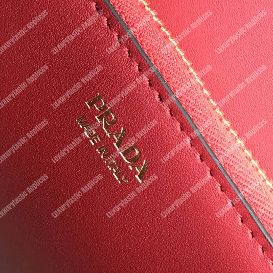 pra*a monoCh*0me saffiano leather bag red