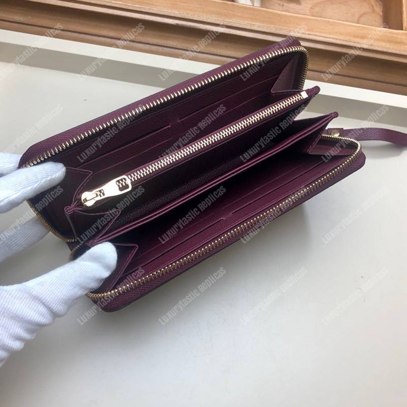 LV Clémence Wallet Monogram Empreinte Leather Raisin