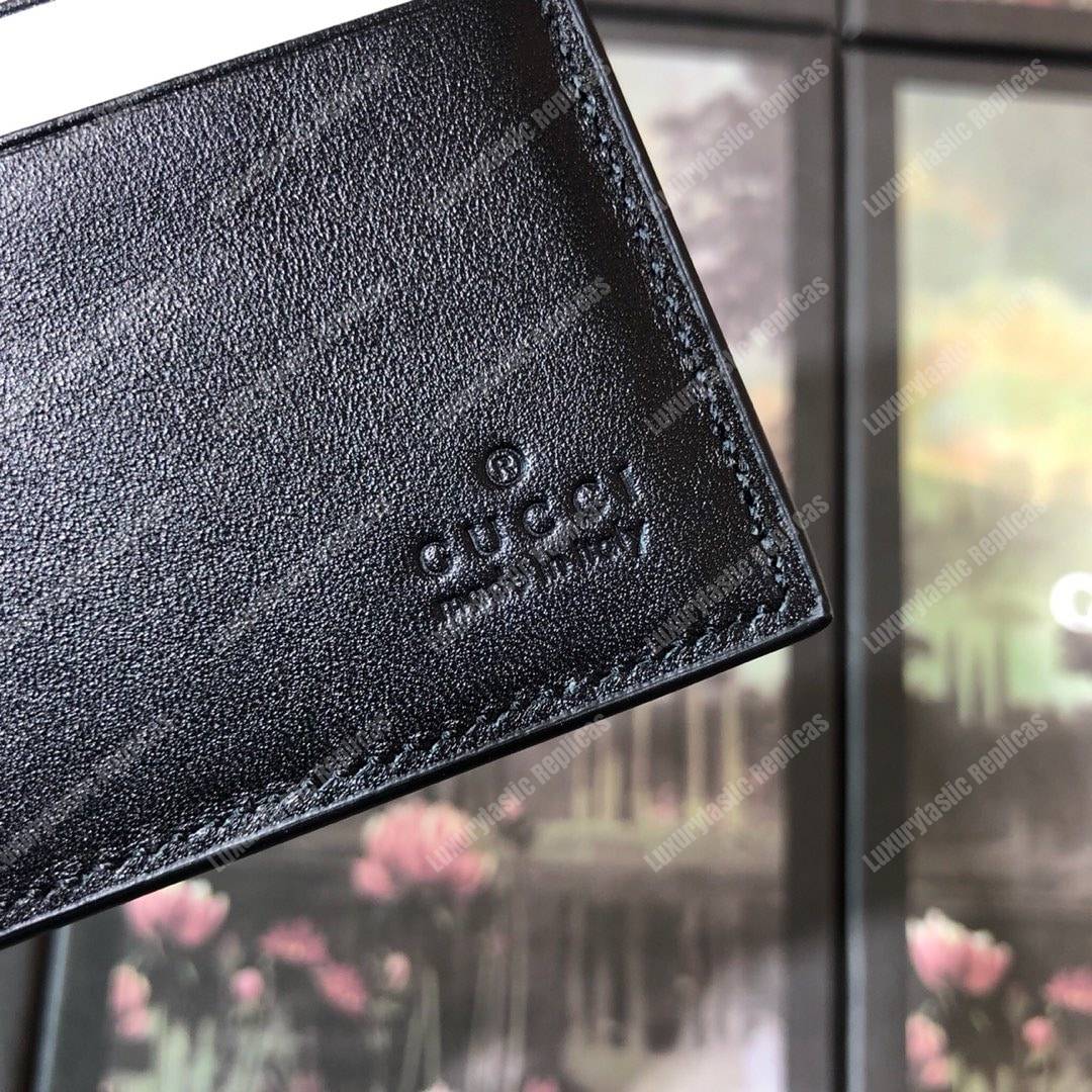 G*u*i gg sup*e wallet with wolf