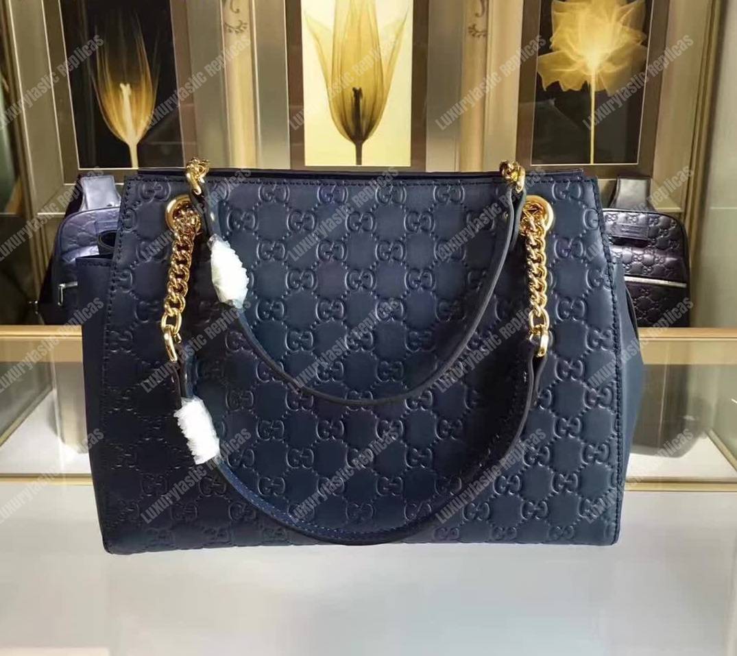 G*u*i signature medium top handle bag blue