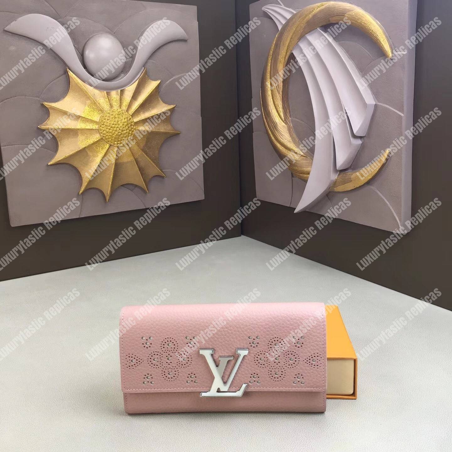 LV Capucines Wallet Magnolia