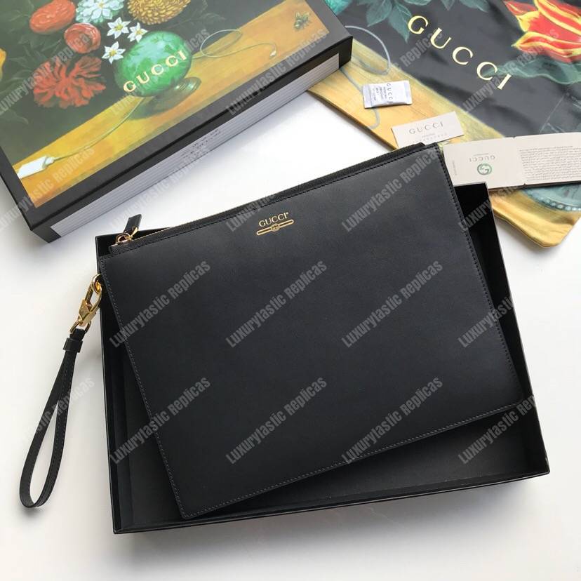 G*u*i leather pouch with G*u*i logo