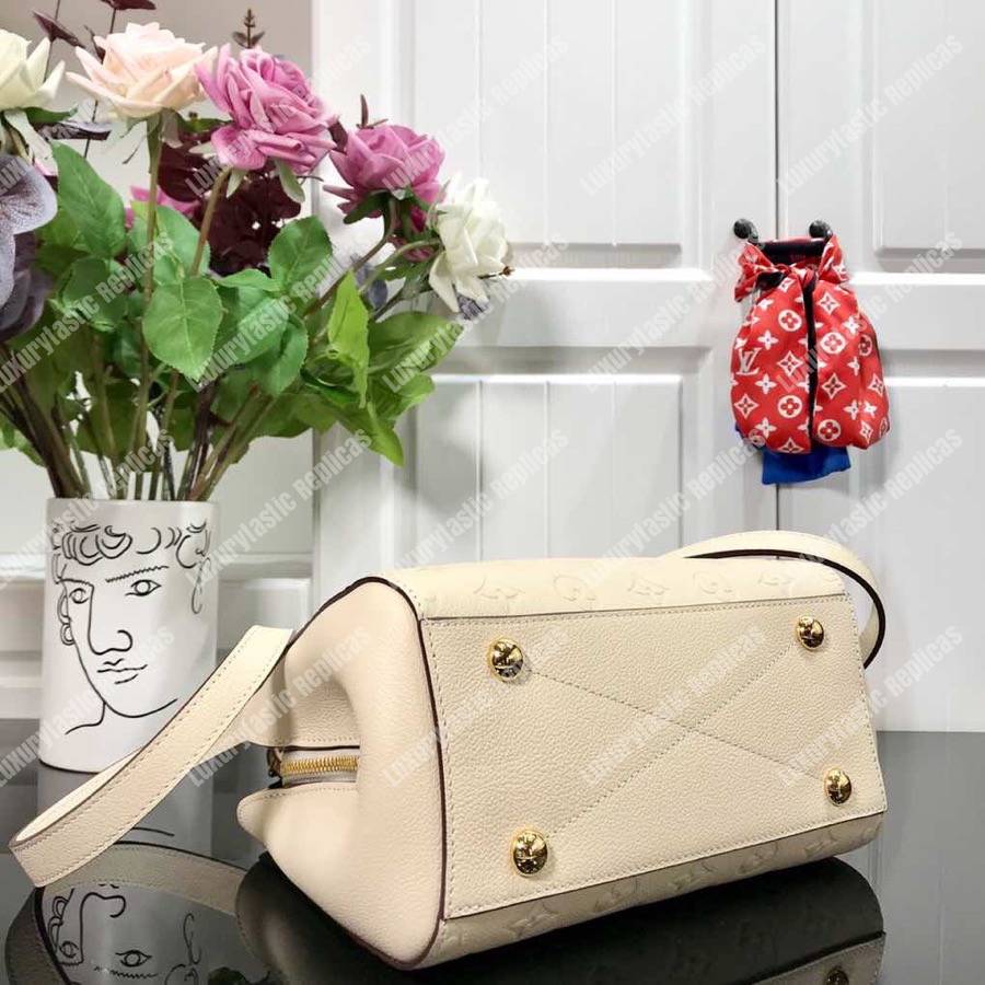 LV Montaigne BB Monogram Empreinte Leather Crème
