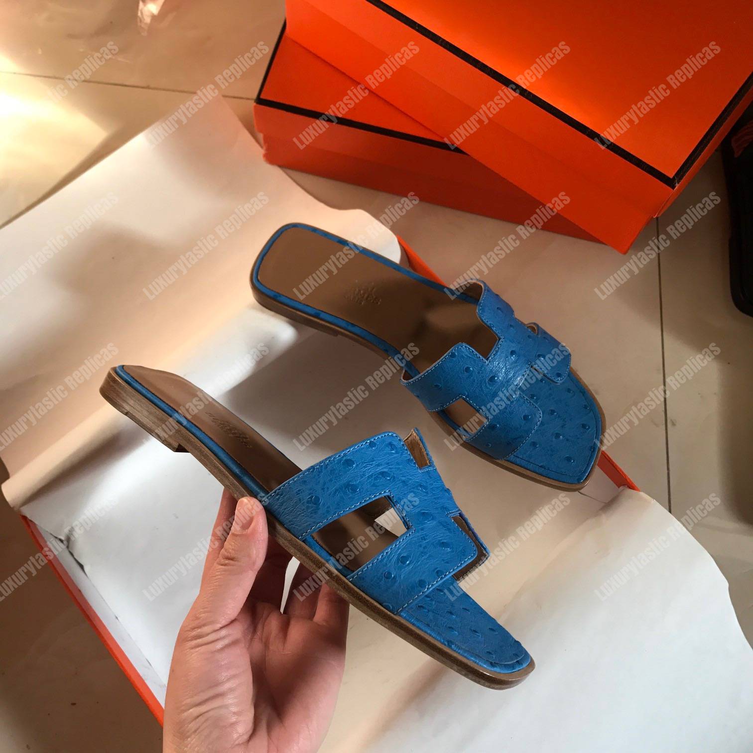 H**mes oran sandal ostrich leather blue