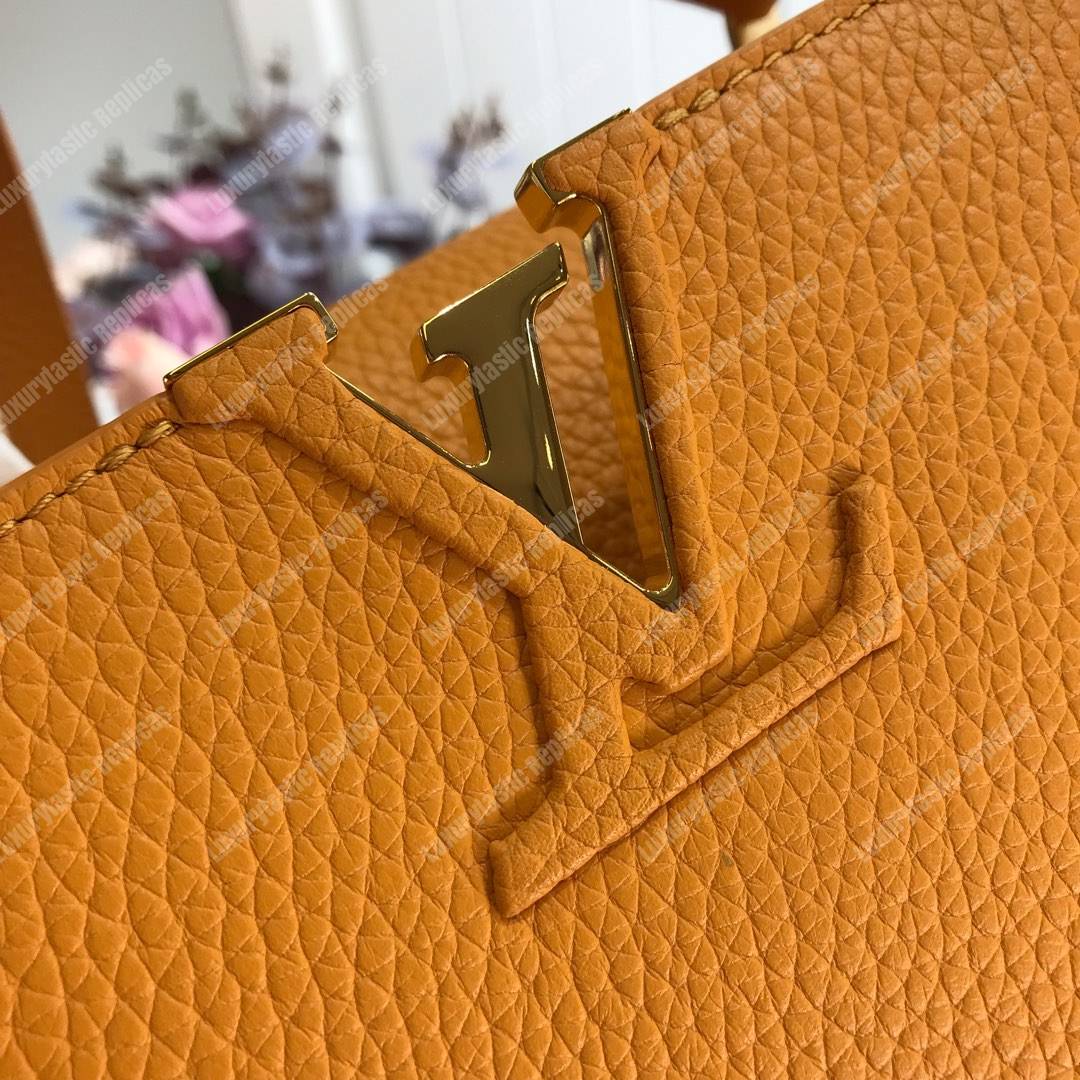 LV Capucines PM Taurillon Leather Ocre
