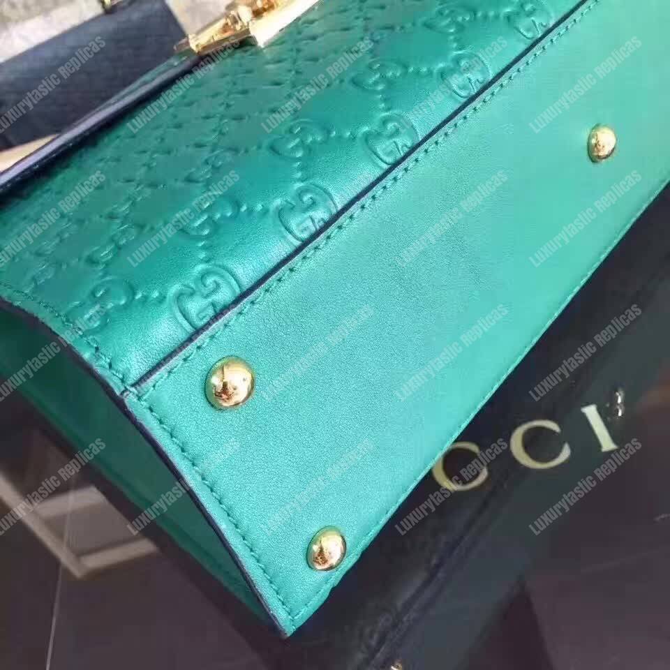 G*u*i padlock medium signature top handle bag emerald green