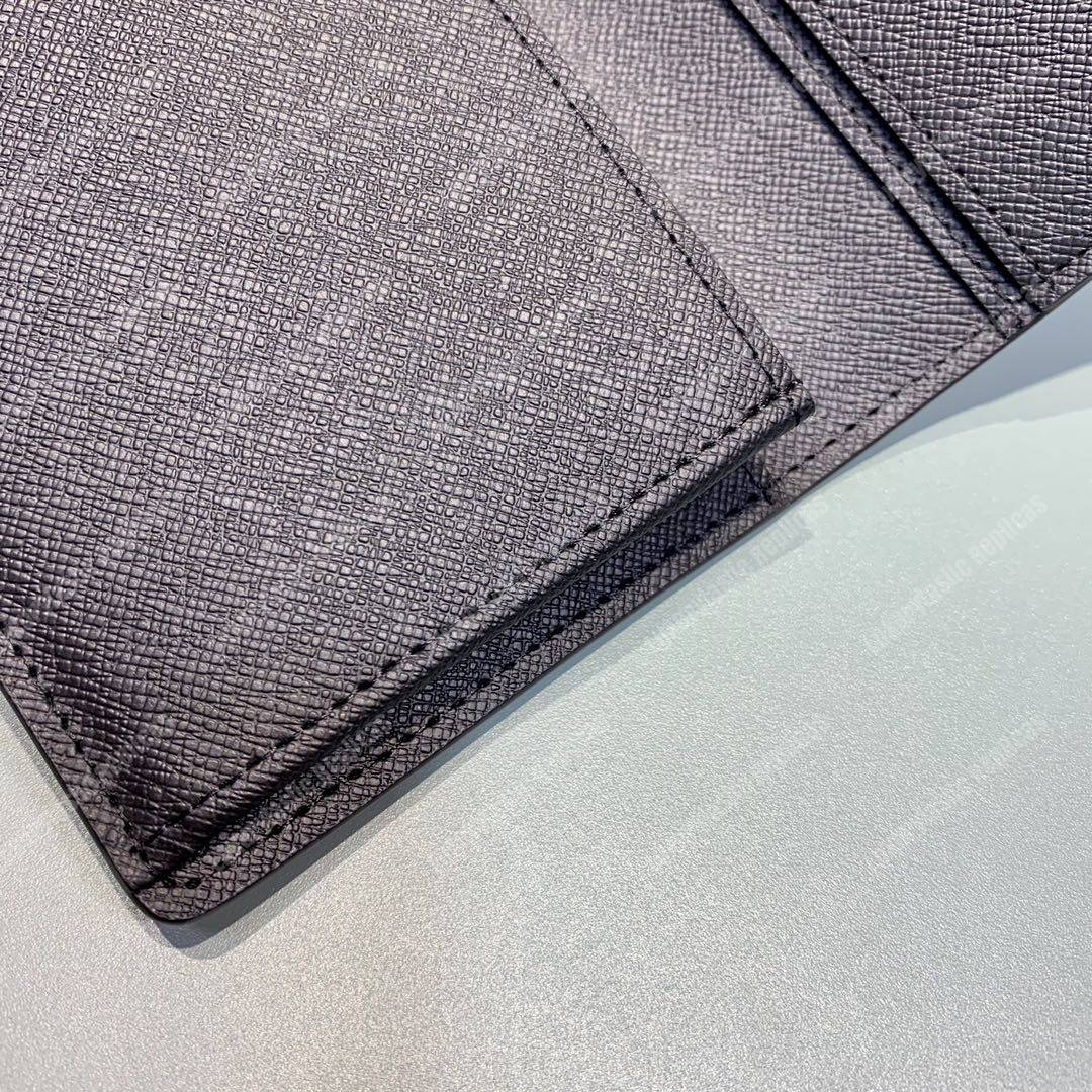 lv brazza taiga articles de voyage l**is V*t*n malletier wallet bleu marine
