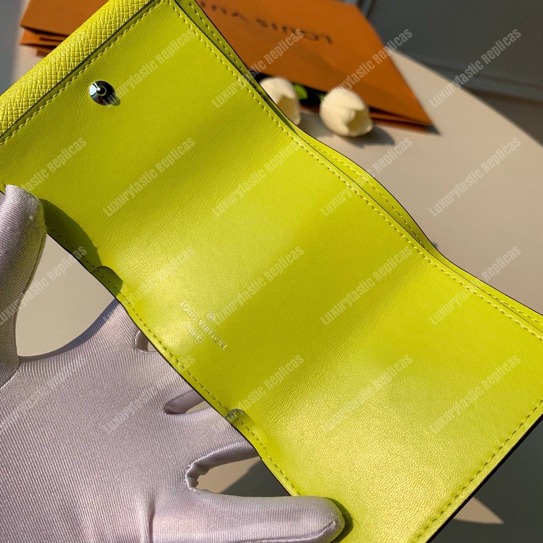LV Discovery Compact Wallet K45 Taiga Monogram Jaune