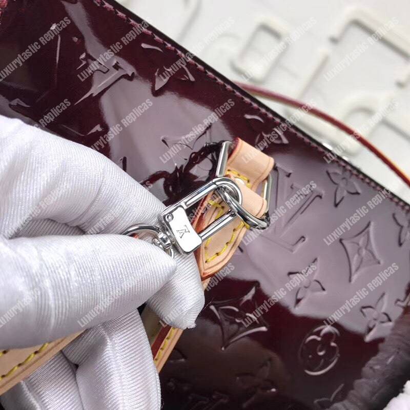 LV Neo Triangle Vernis Leather Amarante