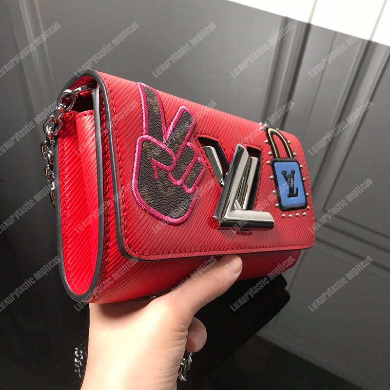 LV Twist Chain Wallet Epi Leather Travel and Trunk-Making Heritage Red