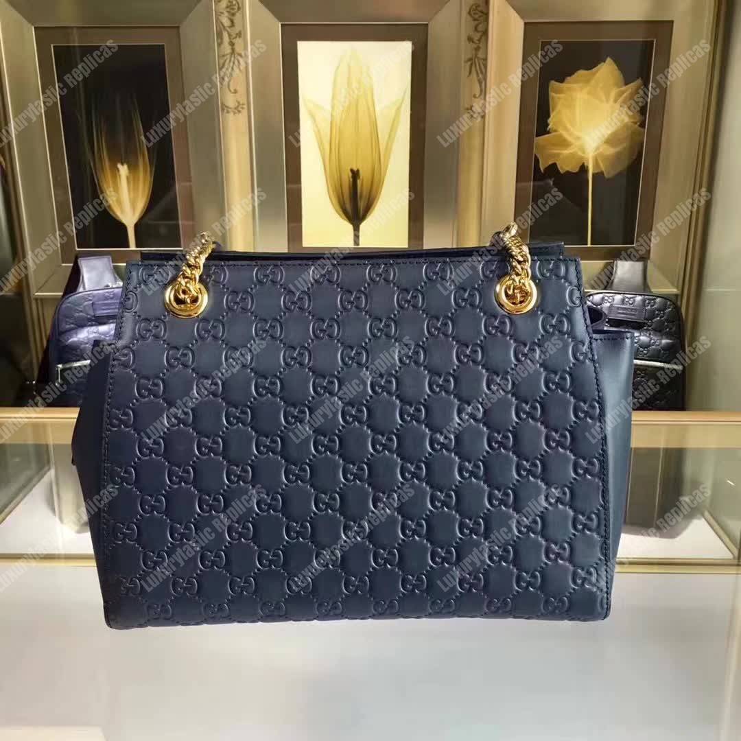 G*u*i signature medium top handle bag blue