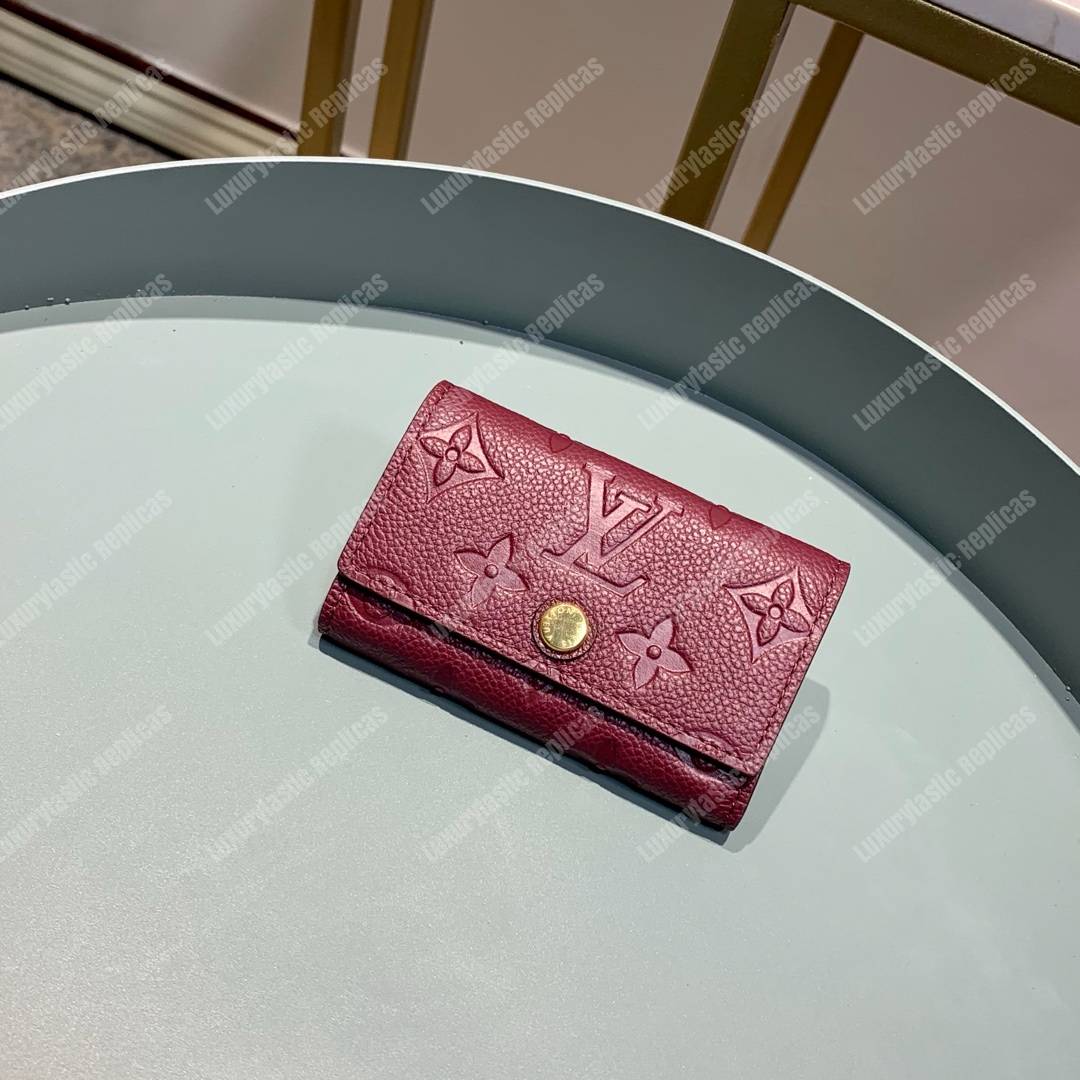 LV 6 KEY HOLDER Monogram Empreinte leather Aurore