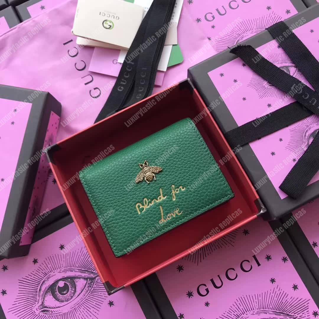 G*u*i animalier card case green with bee