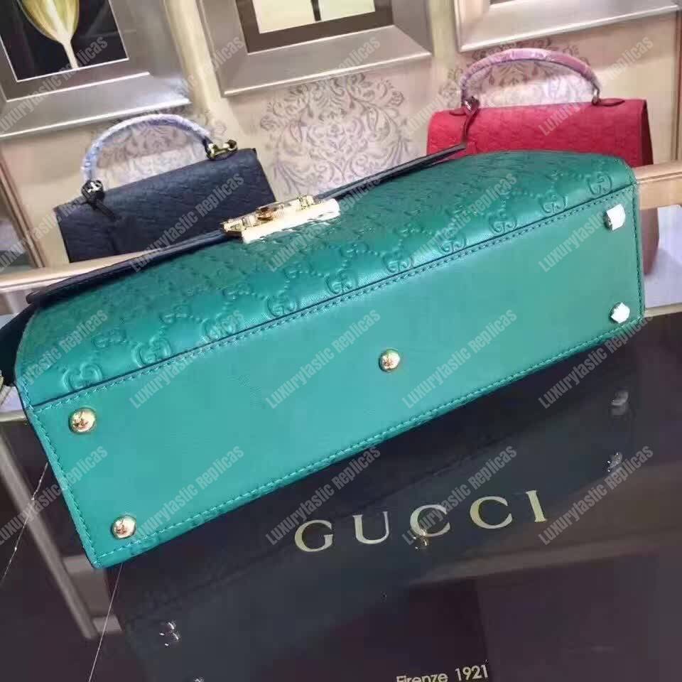 G*u*i padlock medium signature top handle bag emerald green