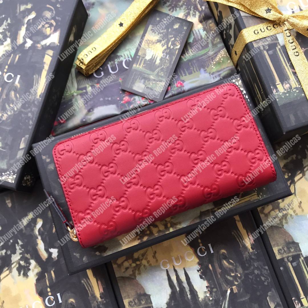 G*u*i signature zip around leather wallet red