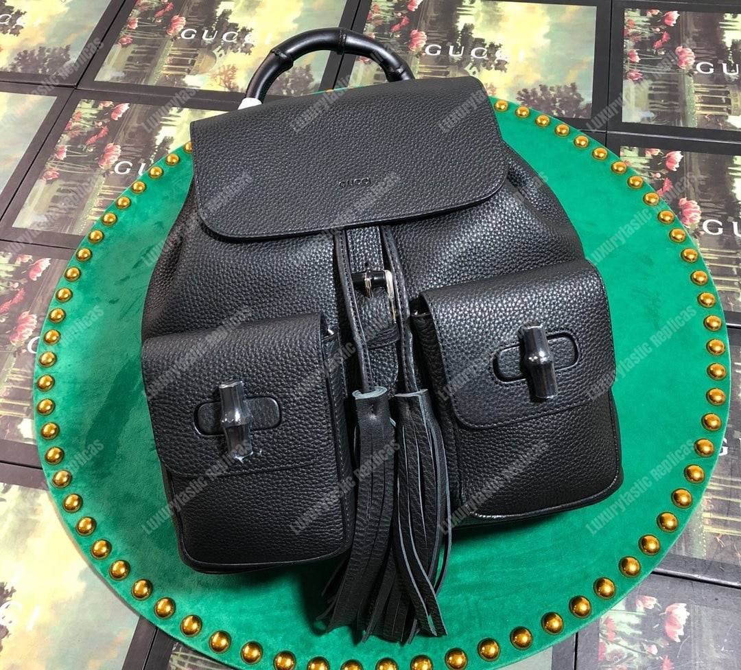 G*u*i leather bamboo tassel backpack black