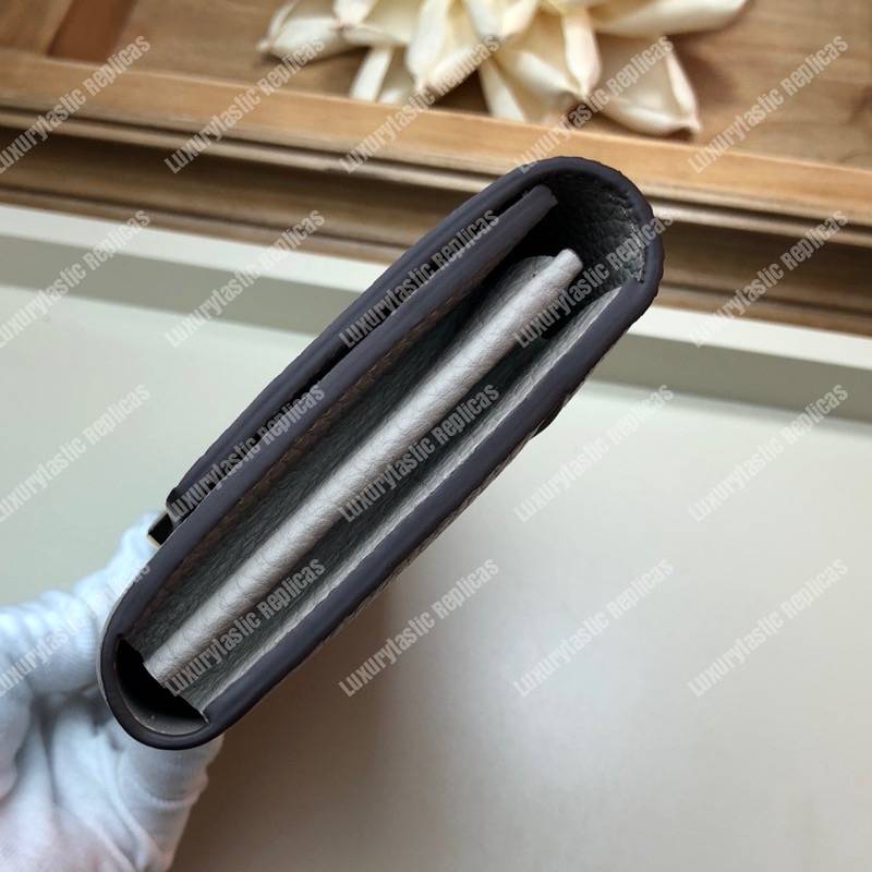 LV Capucines Wallet Taurillon Galet