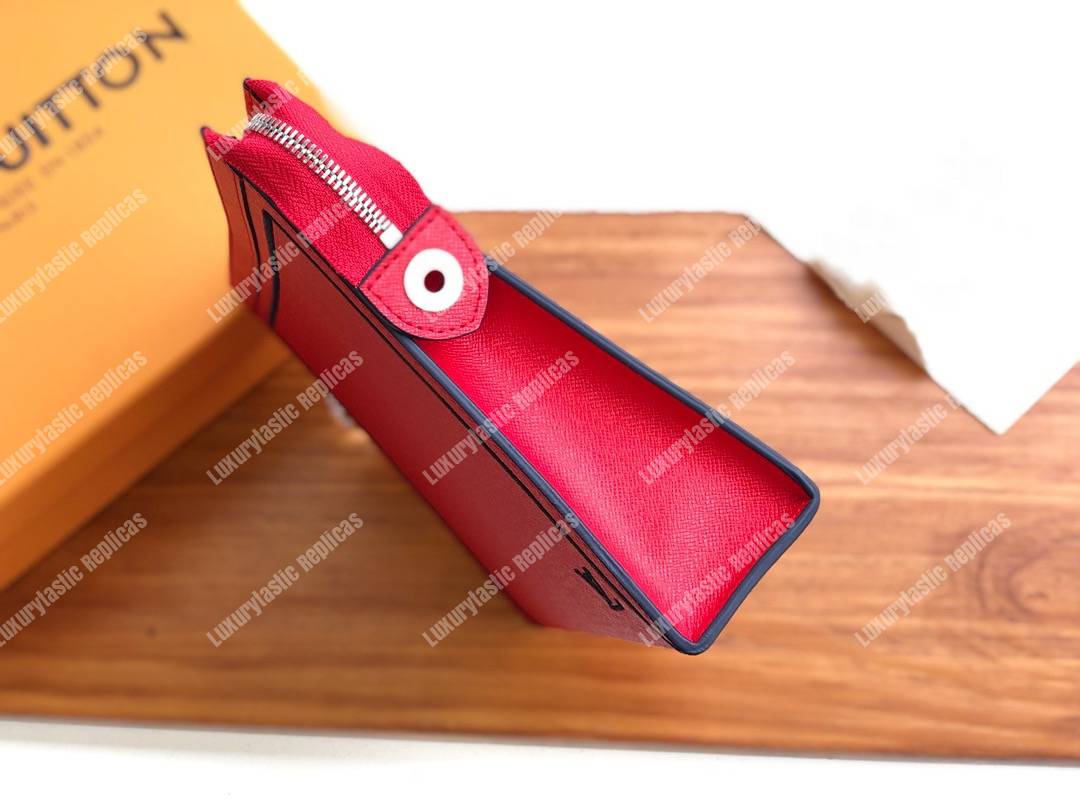 LV Pochette Voyage MM Taiga Leather Red