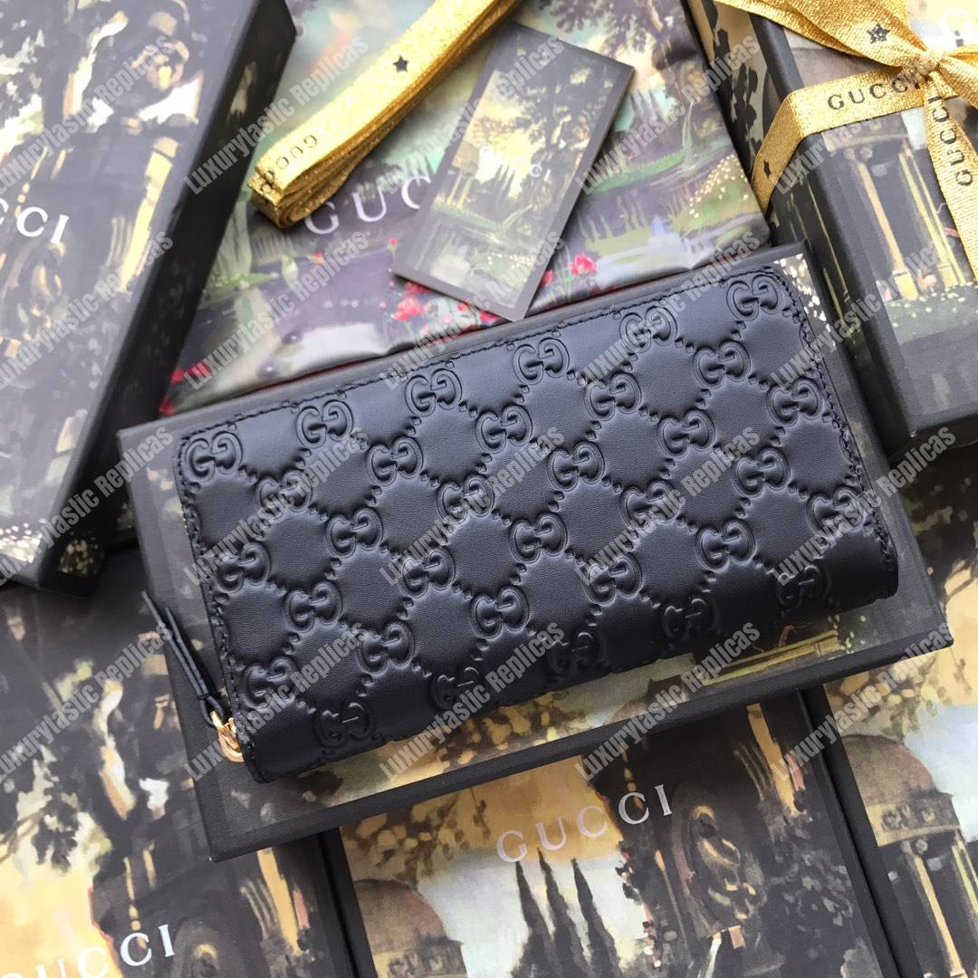 G*u*i signature zip around leather wallet black