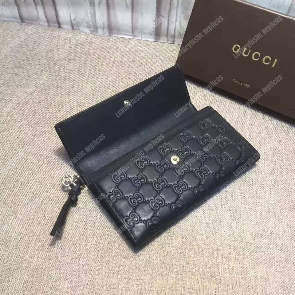 G*u*i gg bree G*u*issima leather flap wallet black
