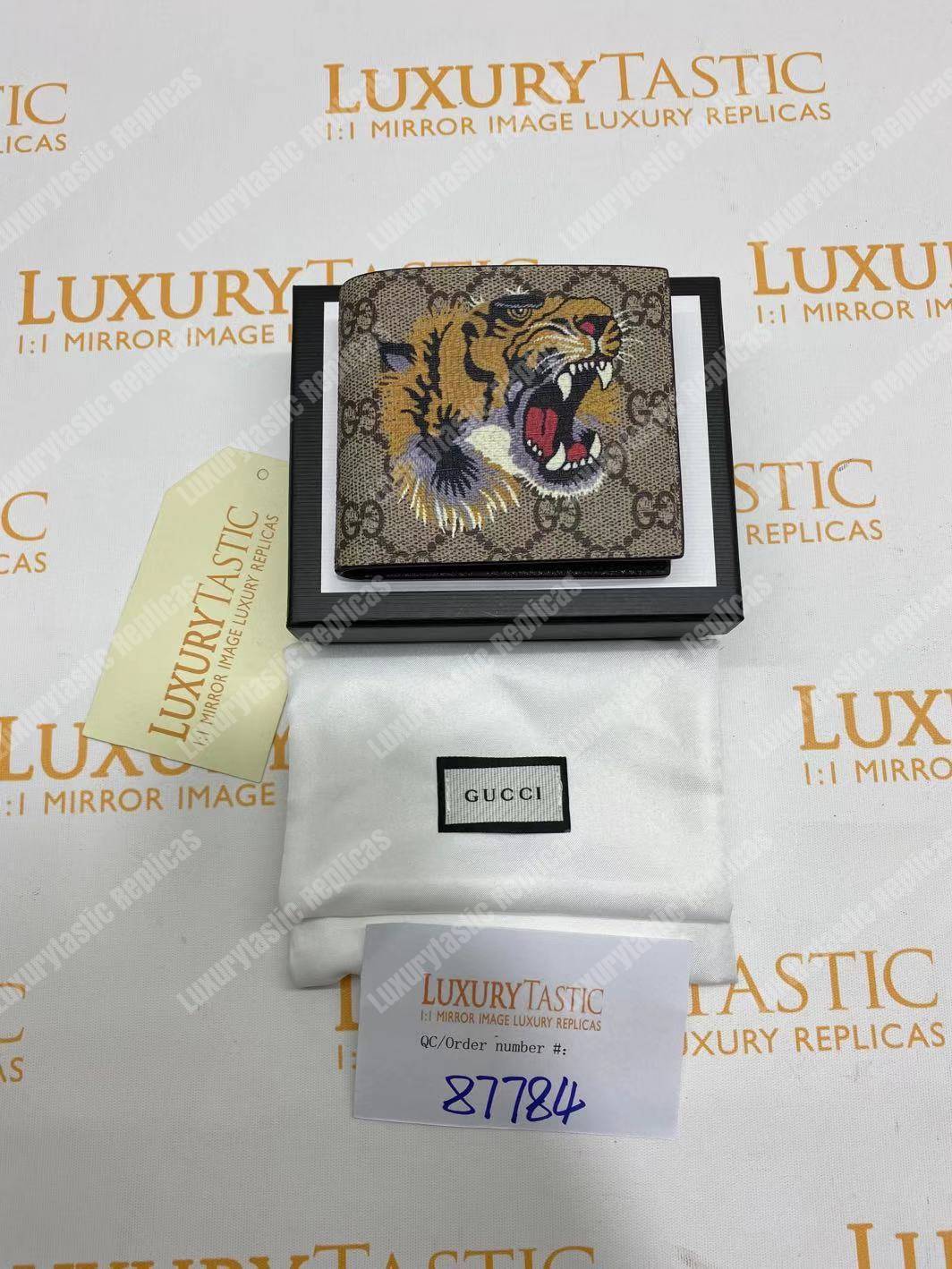 G*u*i tiger print gg sup*e wallet