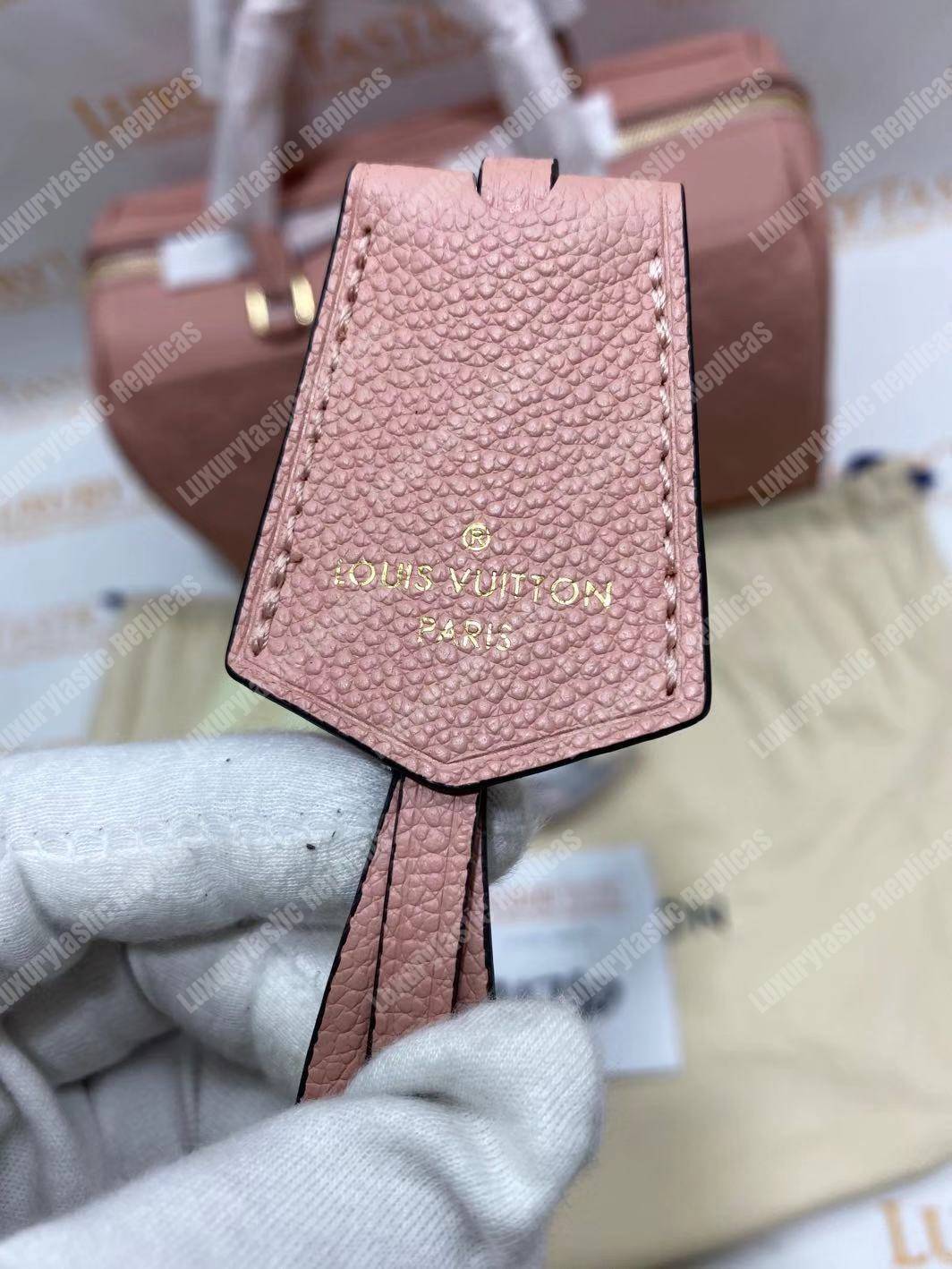 LV Speedy Bandouliere 30 Monogram Empreinte Leather Rose Poudre