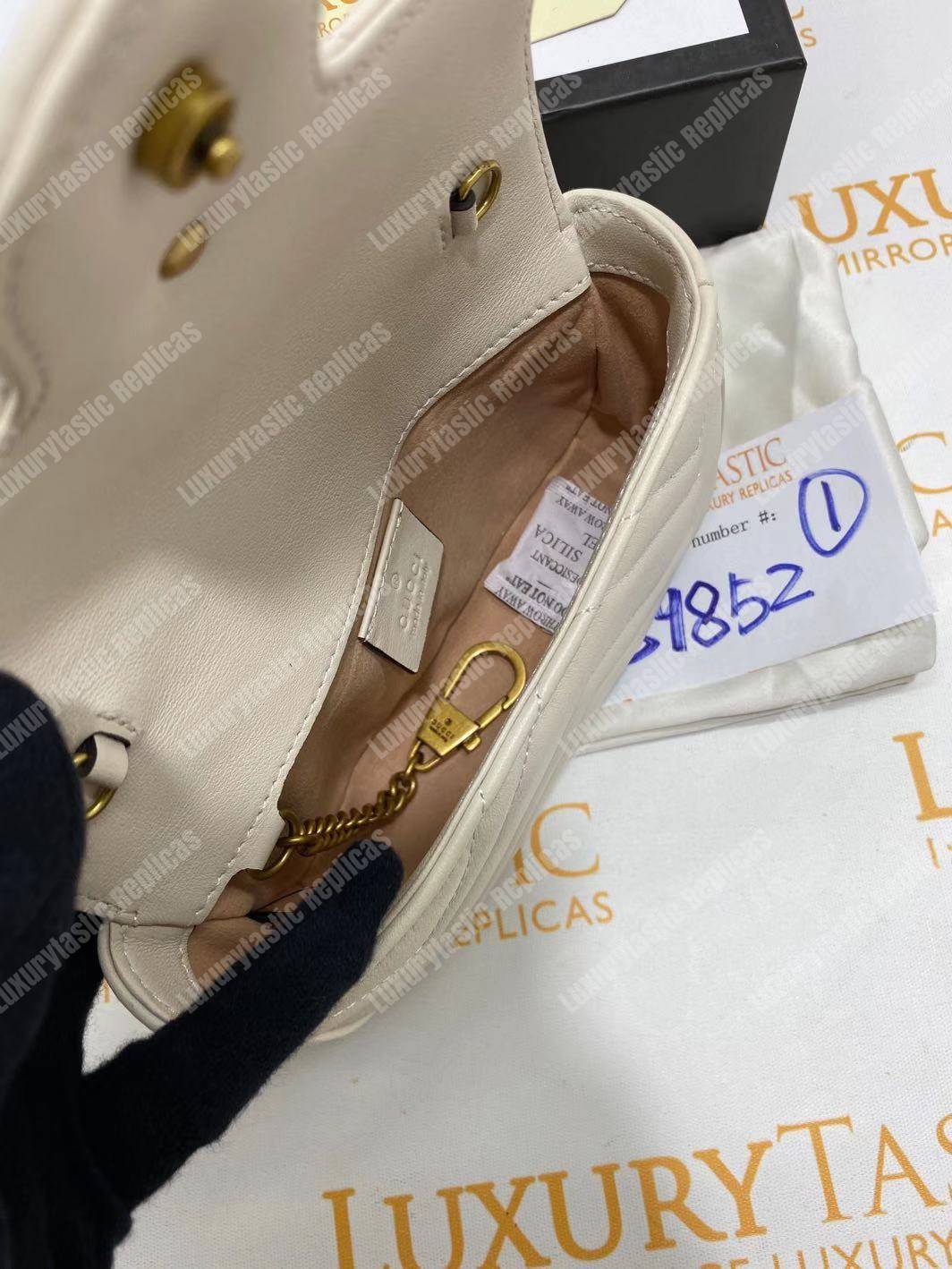 G*u*i gg marmont matelassé super mini bag white