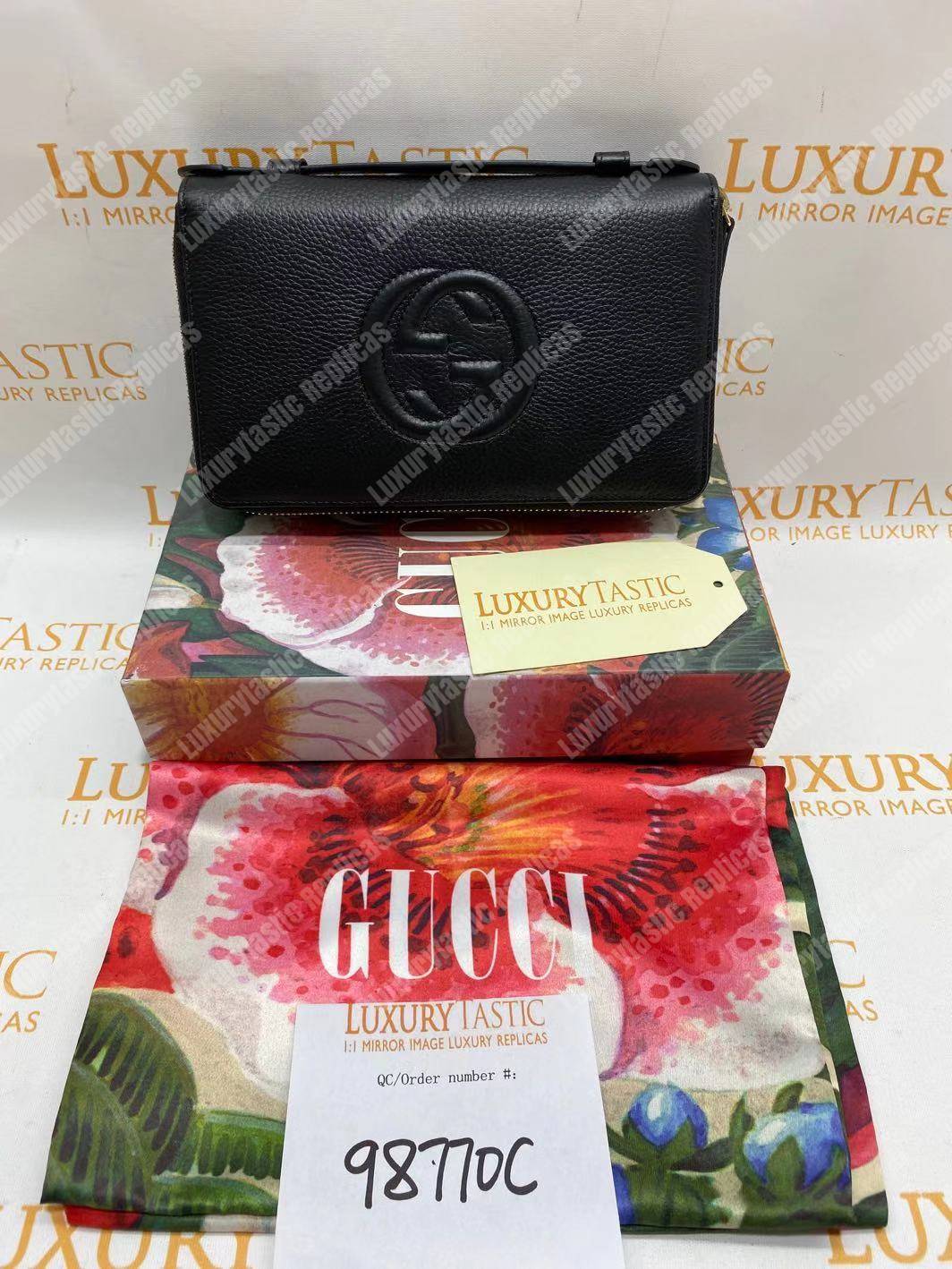 G*u*i pebbled calfskin soho travel document case black
