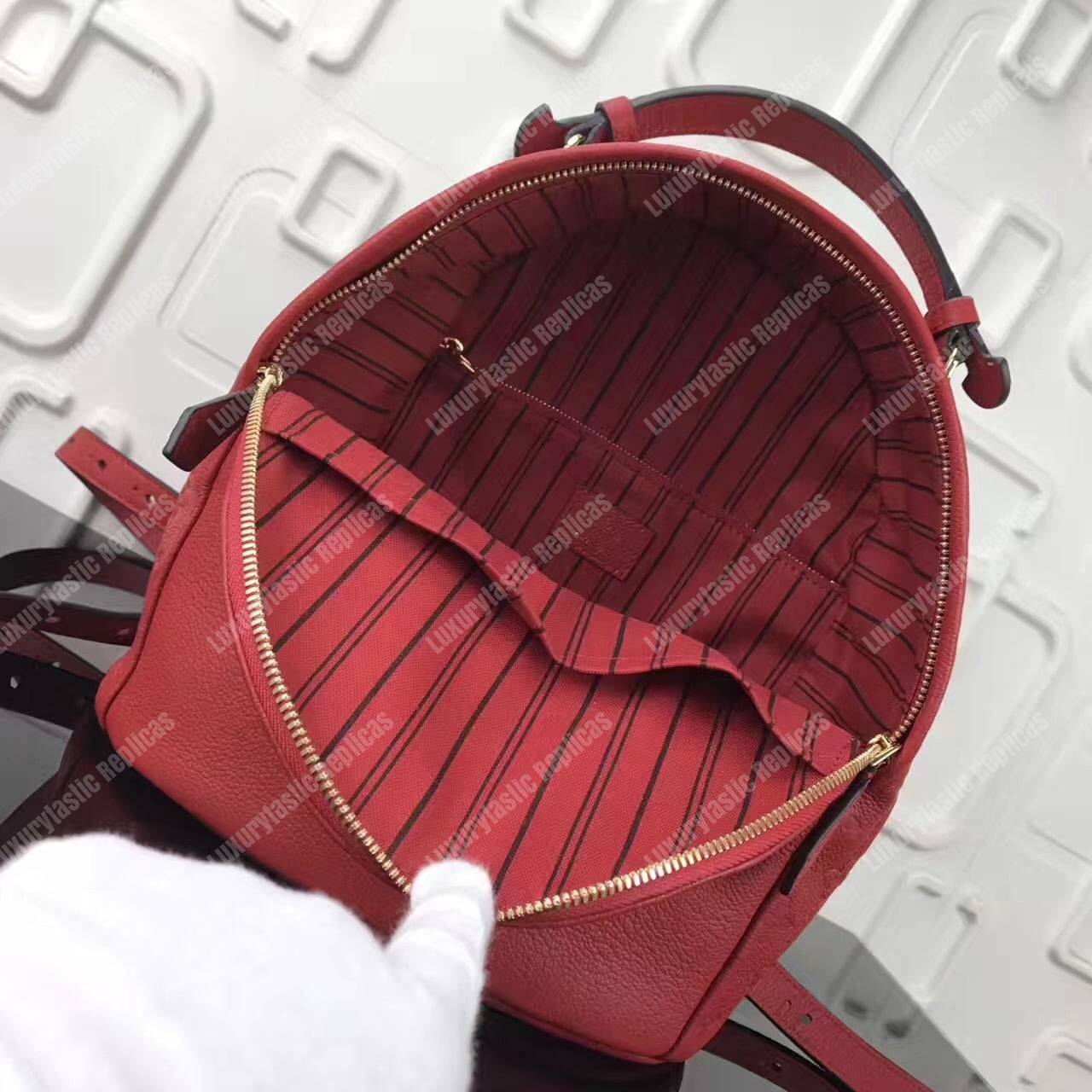 LV Sorbonne Backpack Monogram Empreinte Leather Cerise