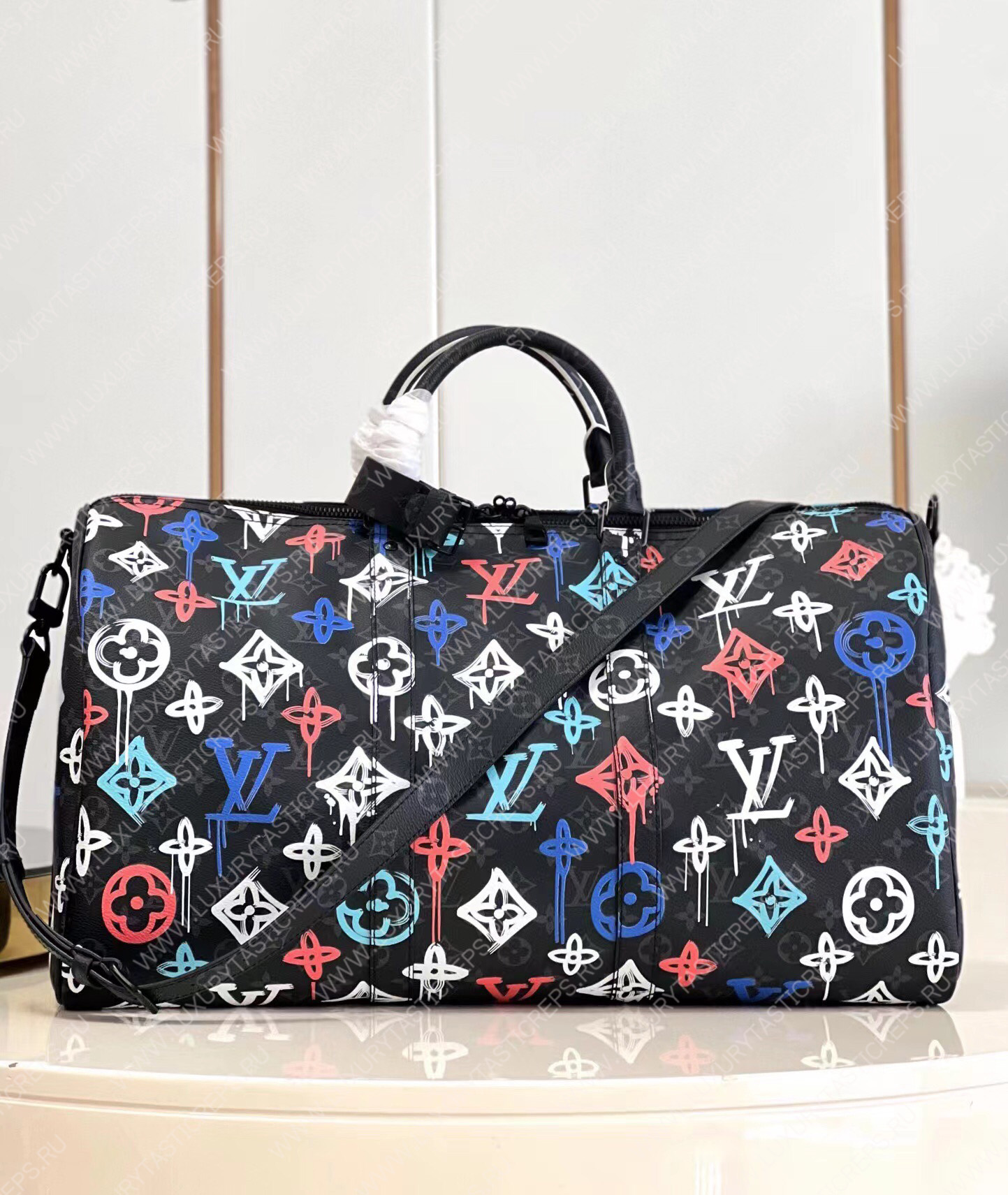 KEEPALL BANDOULIÈRE 50 GRAFFITI ORANGE