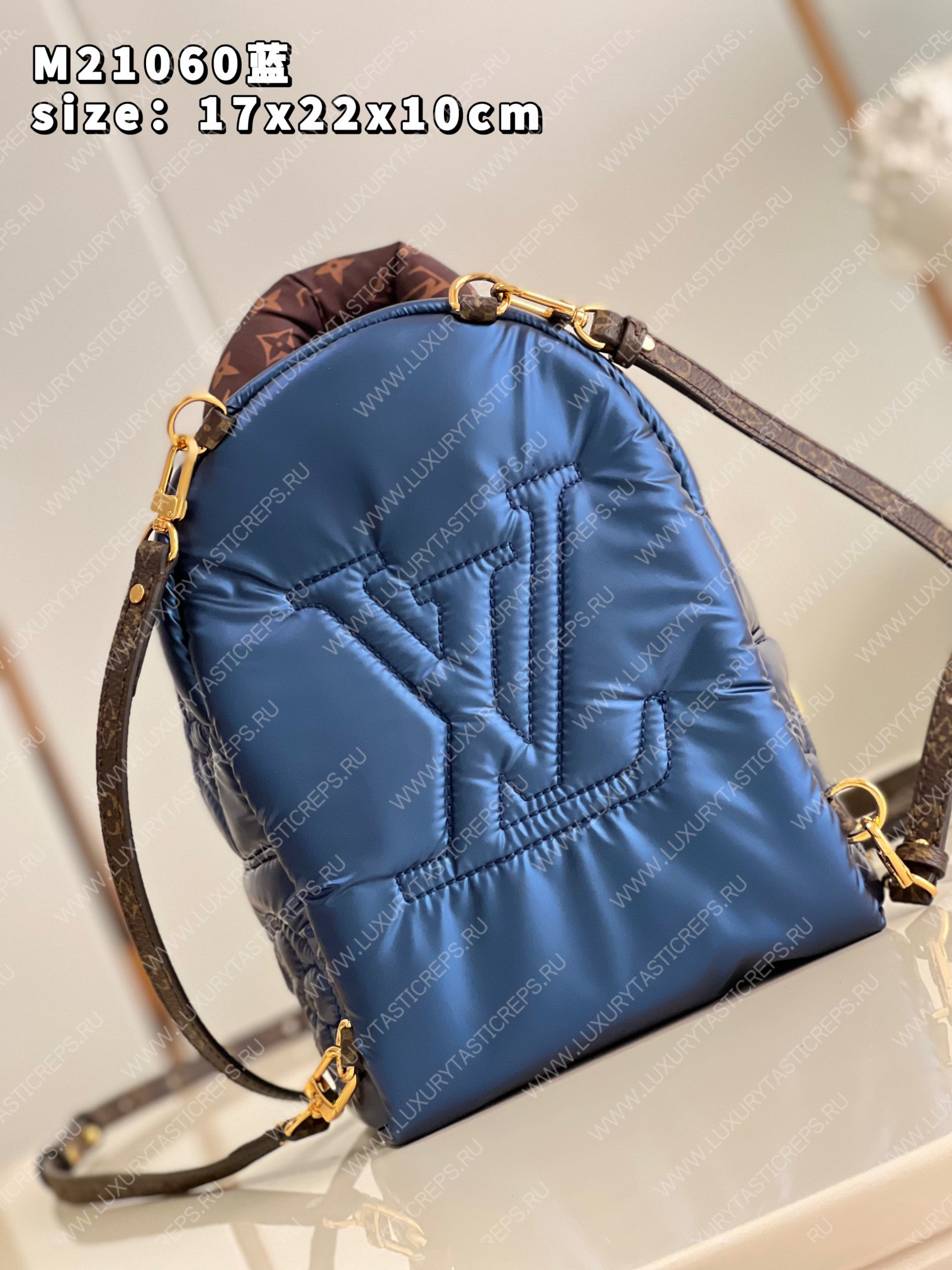 l**is V*t*n palm springs mini blue m21060