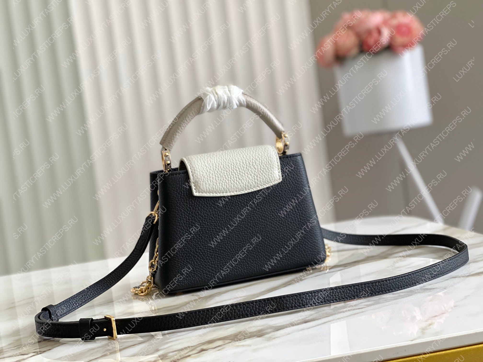 l**is V*t*n capucines mm black m20708