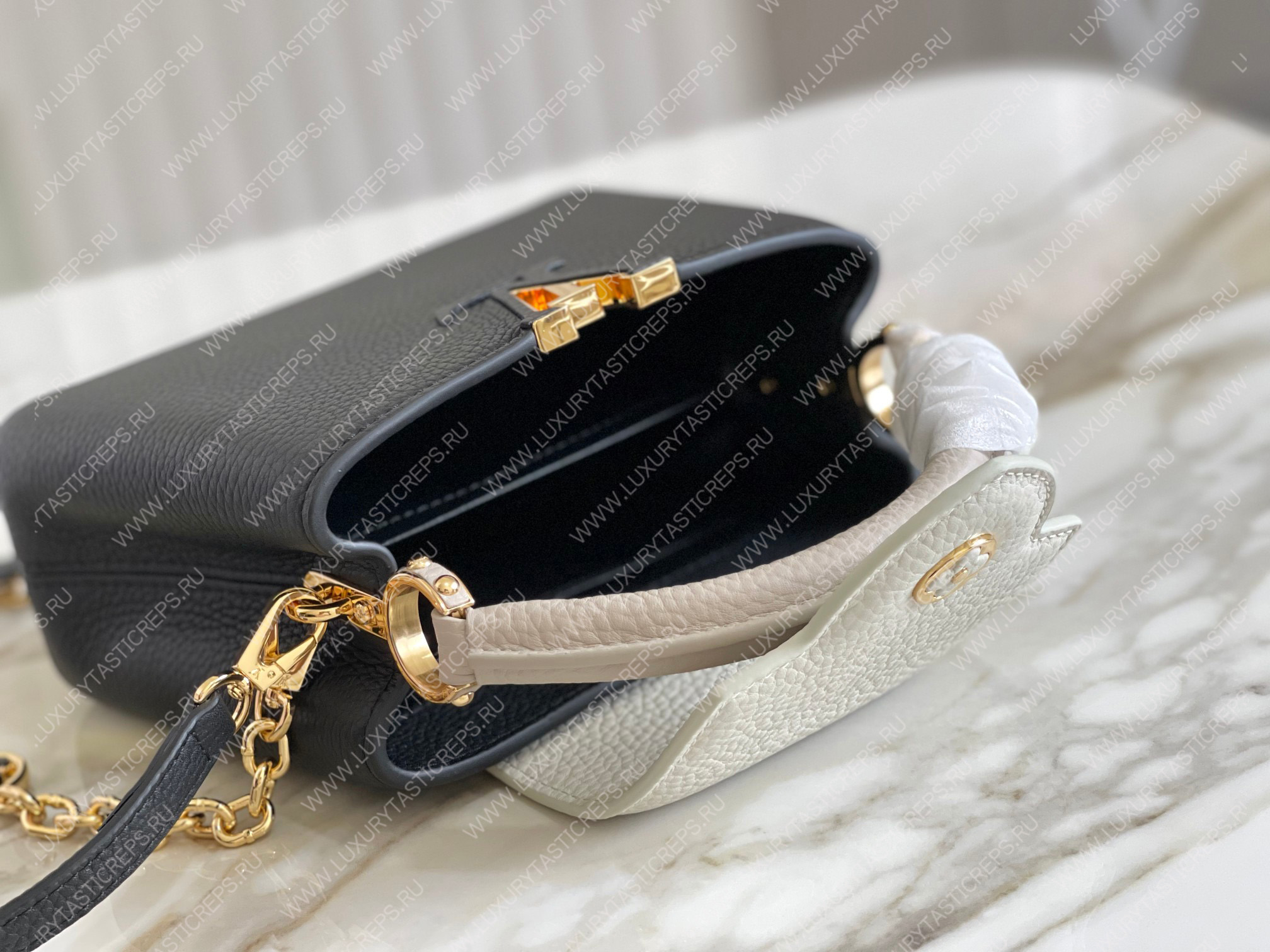 l**is V*t*n capucines mm black m20708